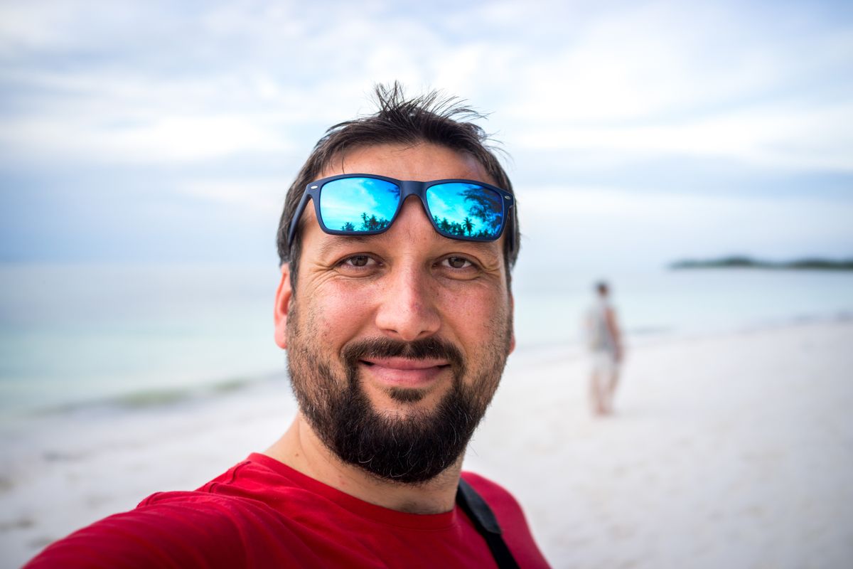 Adult,Man,Enjoying,On,Tropical,Beach